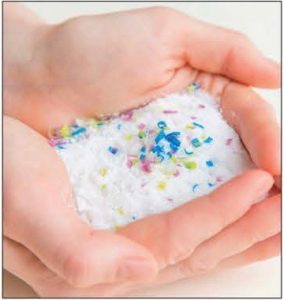 microplastics in someone's hands