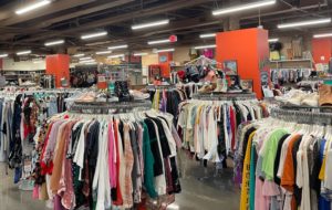 Racks of clothing at Buffalo Exchange thrift store