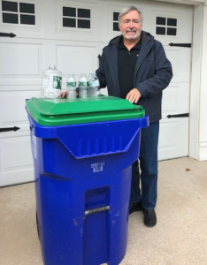 Hammonton resident Bill Cappuccio stands beside one days’ worth of plastic usage