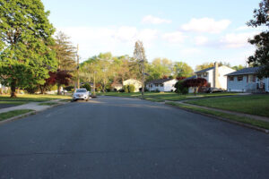 Two-story homes along a tree lined street