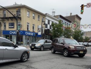 Near bumper-to-bumper traffic on a small urban street