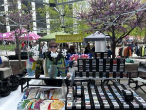Items on display at a table at an outdoor market